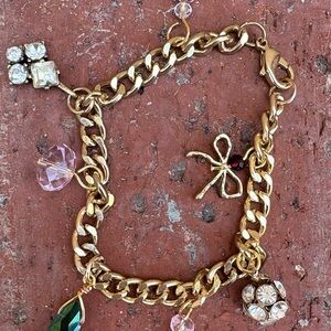 Repurposed Charm Bracelet Goldtone with quality charms.